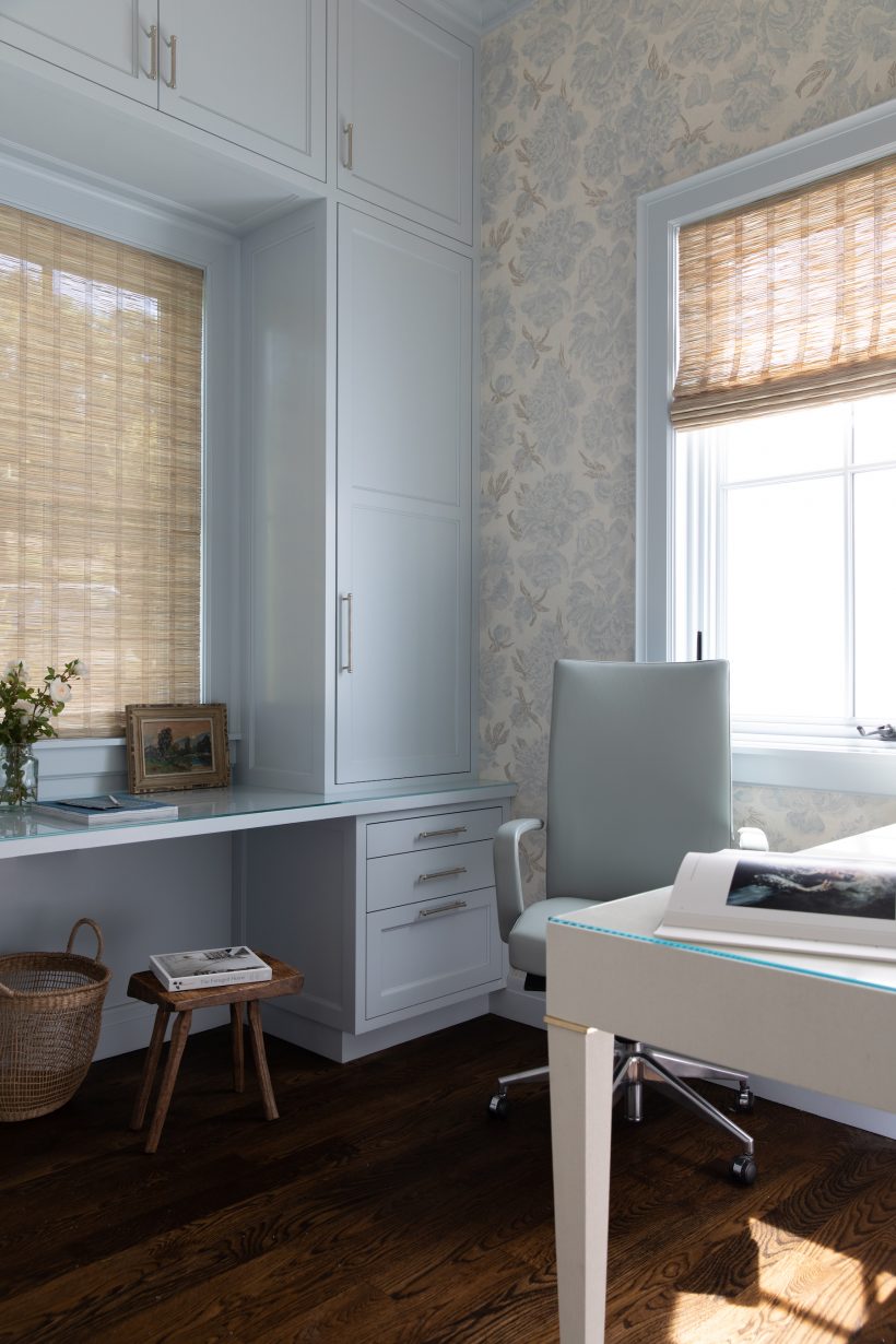 serene home office with blue wallpaper