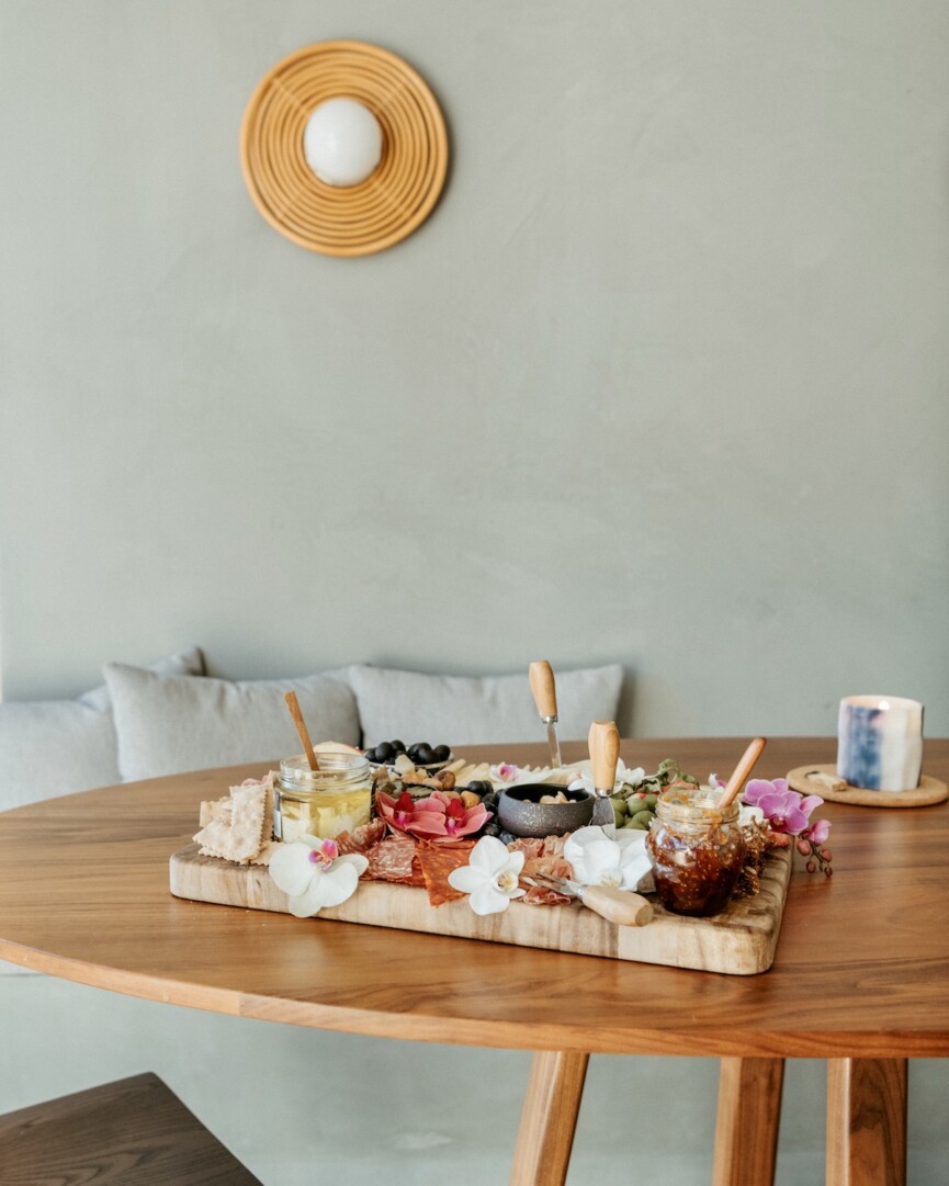 cheese board with colorful painted wall, brian and jessie de lowe dinner party in santa barbara