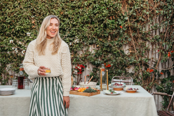 olivia muniak at home, dinner party hostess, backyard dinner party, laughing