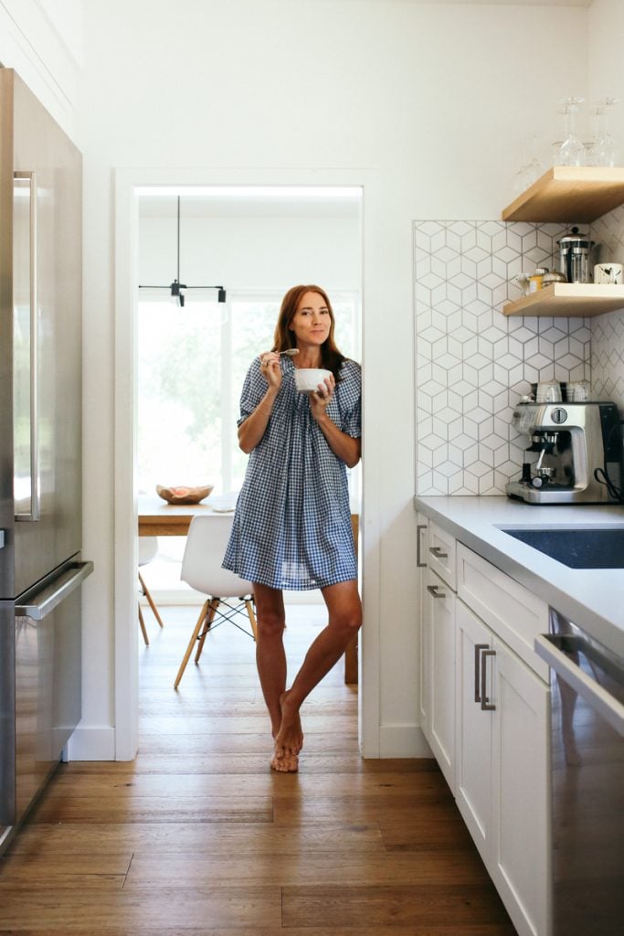 Samantha Wennerstrom eating breakfast in her kitchen_mini dresses