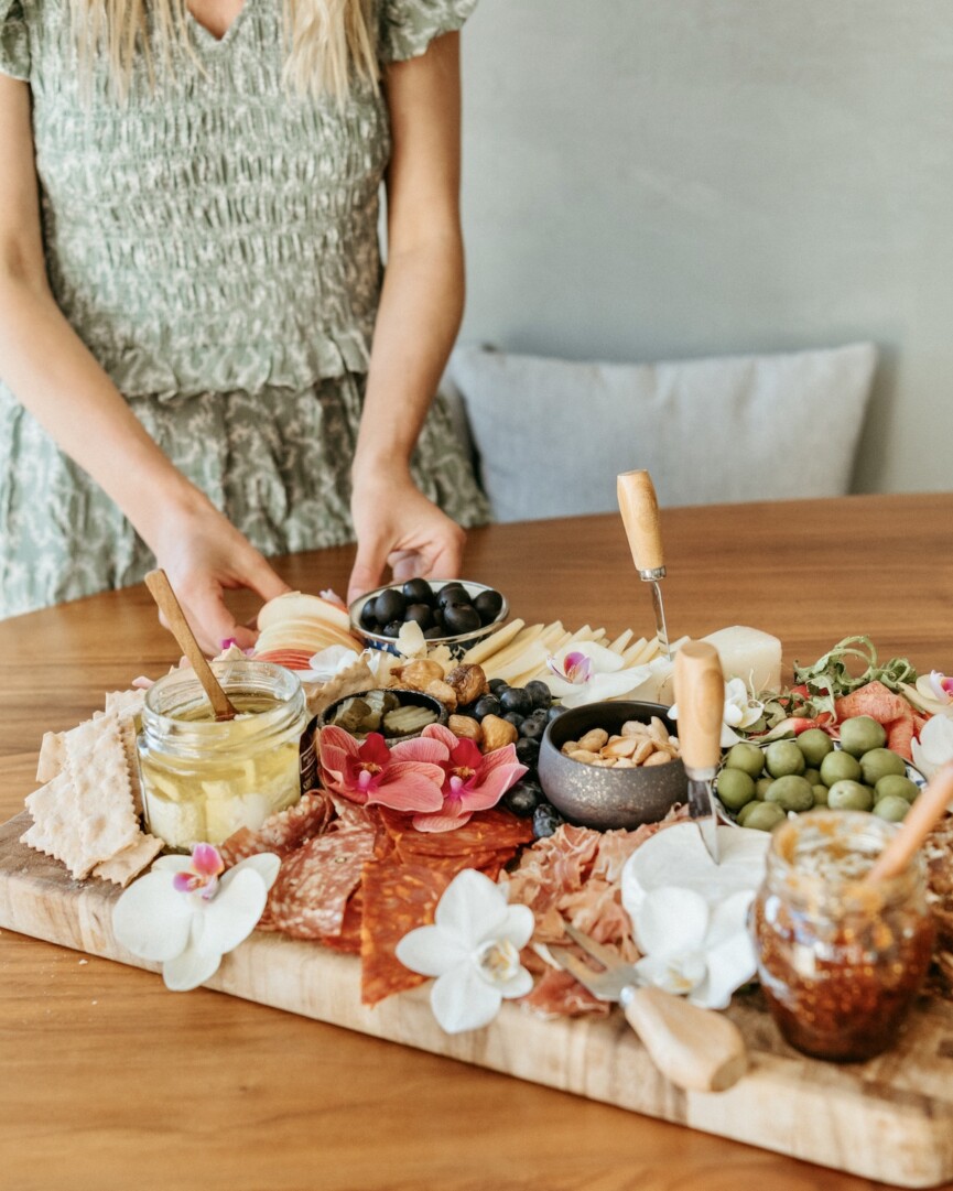 cheese board with colorful painted wall, brian and jessie de lowe dinner party in santa barbara