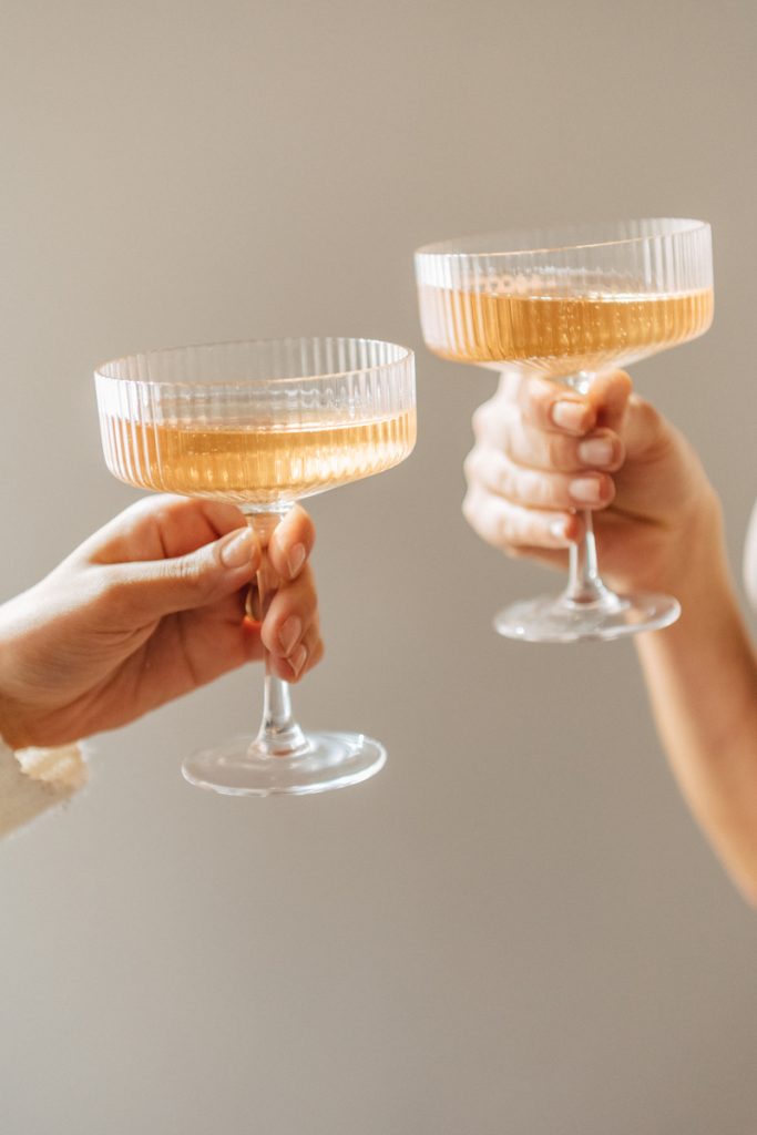 sparkling rosé in coupe glasses_6 life lessons learned from turning 40
