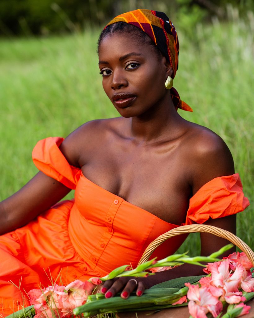 beauty woman orange dress field