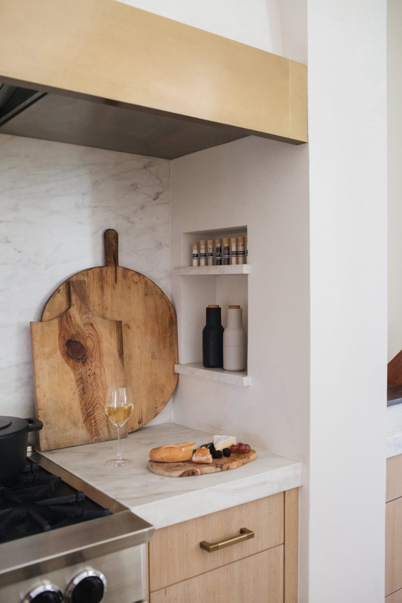 marble counter with wooden cutting board