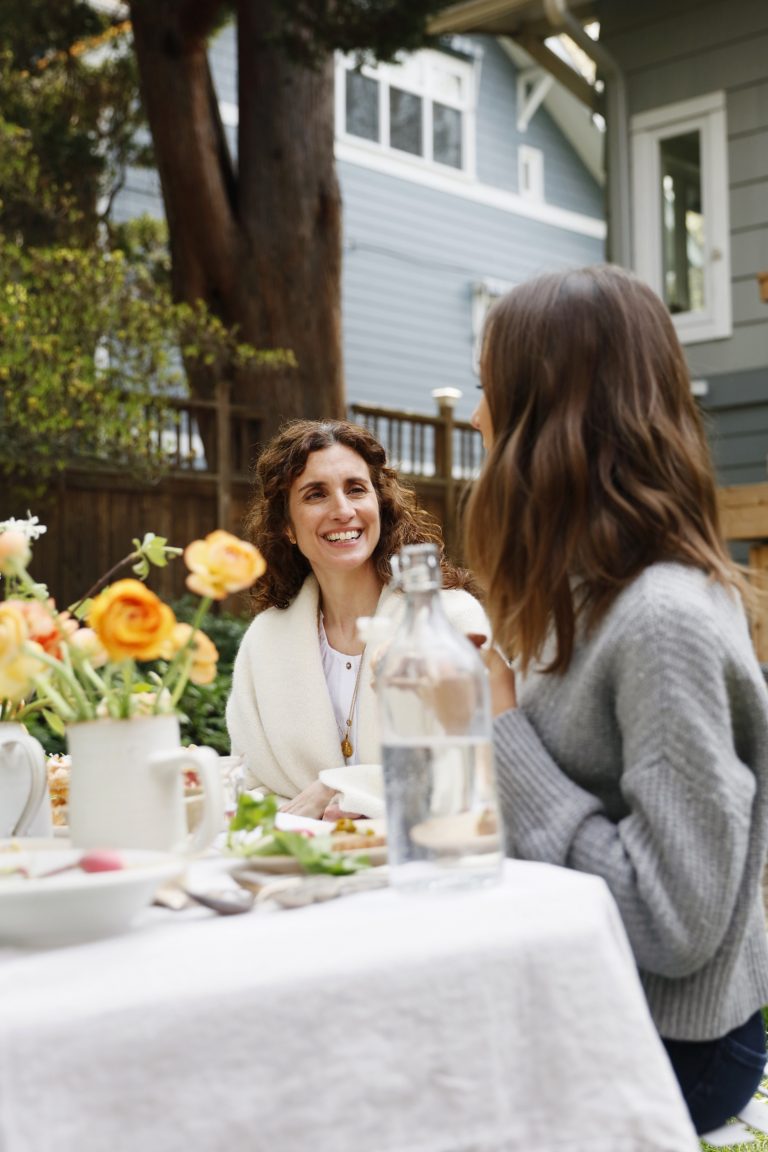 dinner party with flowers, flatbread, friends