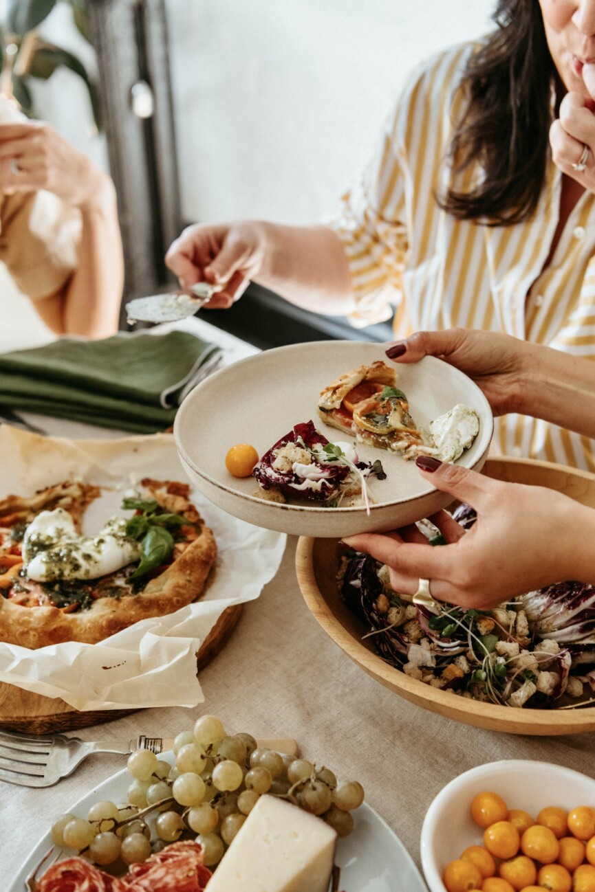 friends at italian appetizer dinner party, cassandra lavalle hosting tips