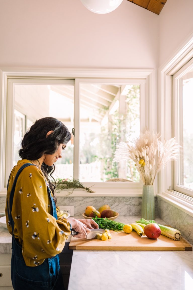 Kimberly Snyder preparing vegetables