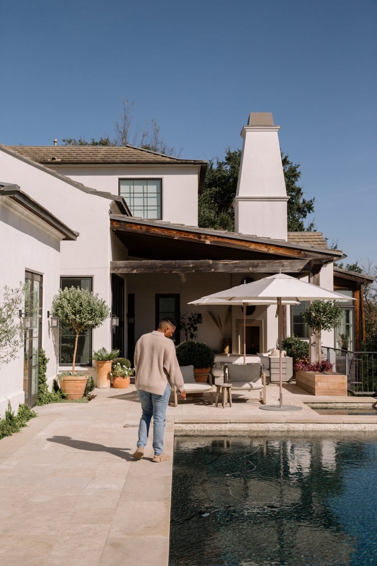 Woman walking by pool Austin, Texas_ayurvedic morning rituals