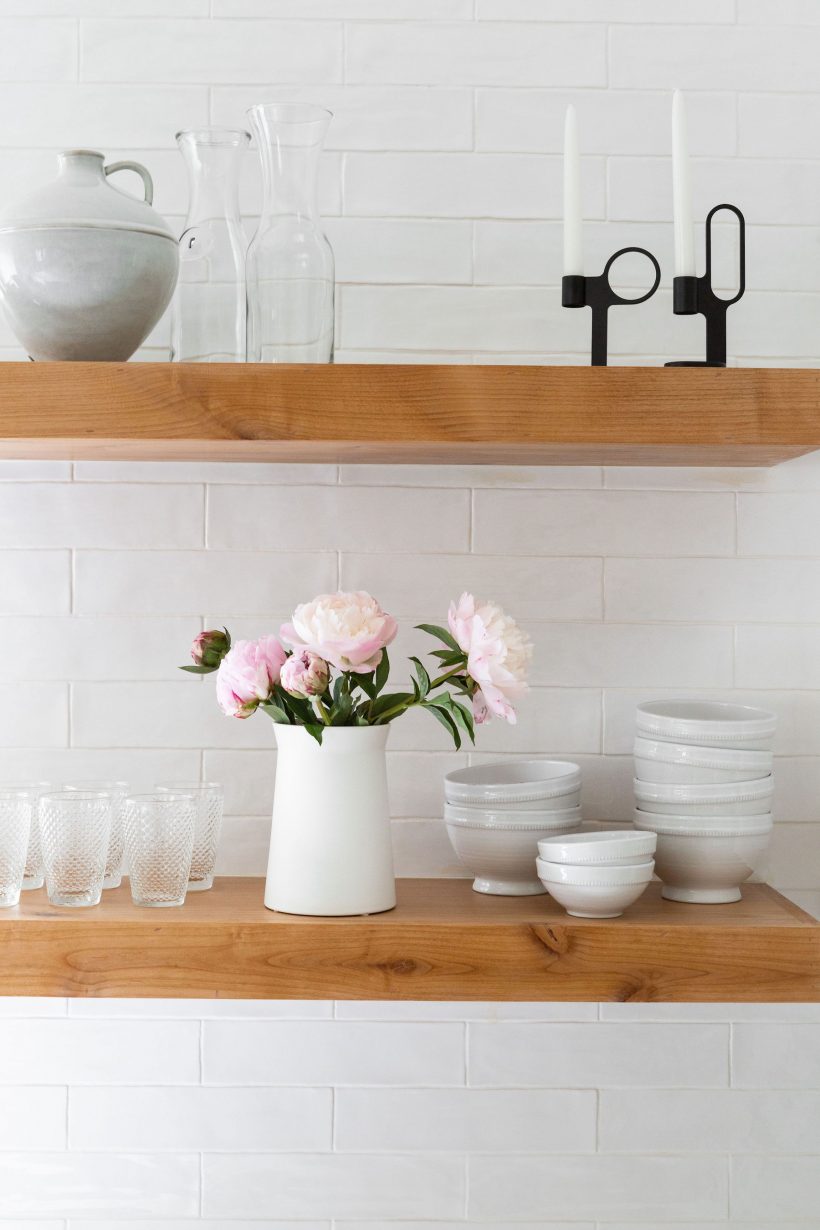 white vase and white dishes