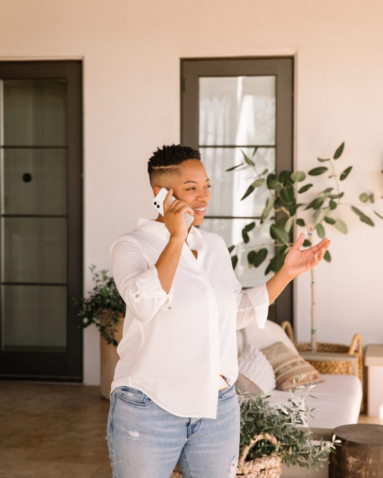 woman talking on the phone_positive social media habits