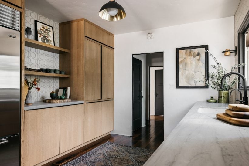 Earthen kitchen with wooden cabinets