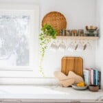 white kitchen with cutting boards