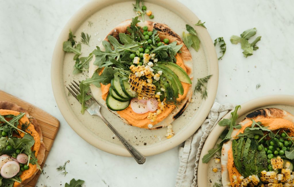 This Roasted Carrot and Red Pepper Hummus Flatbread Is a Delicious Way To Clean Out Your Fridge