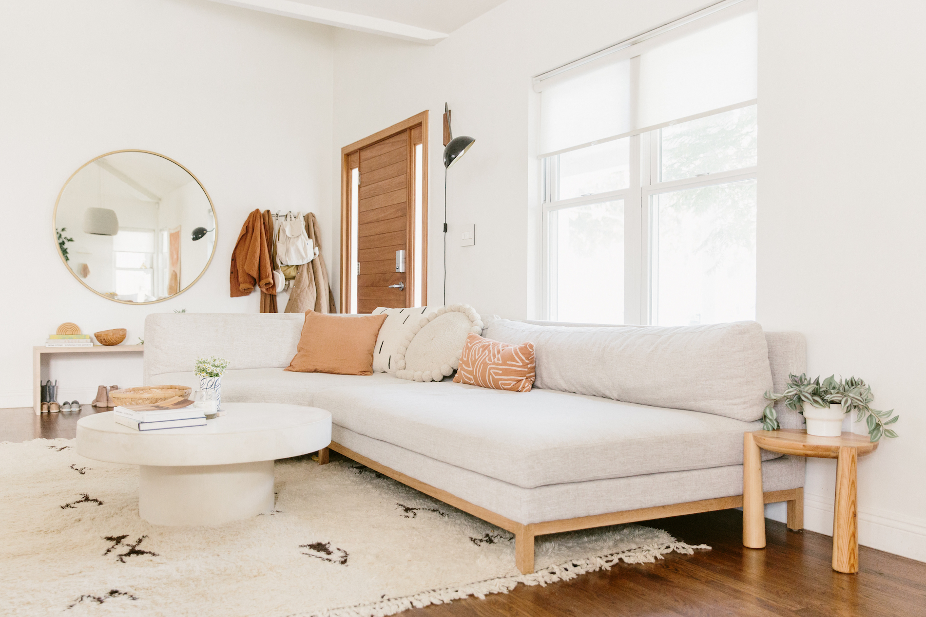 cream-living-room-with-terra-cotta-accents - Camille Styles