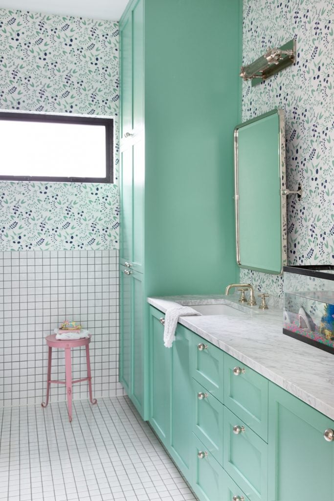 Kim West colorful bathroom with green cabinets_powder room décor ideas