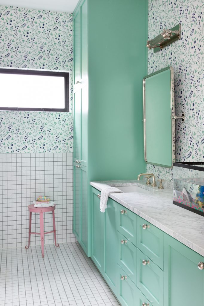 Kim Tay colorful bathroom with green cabinets