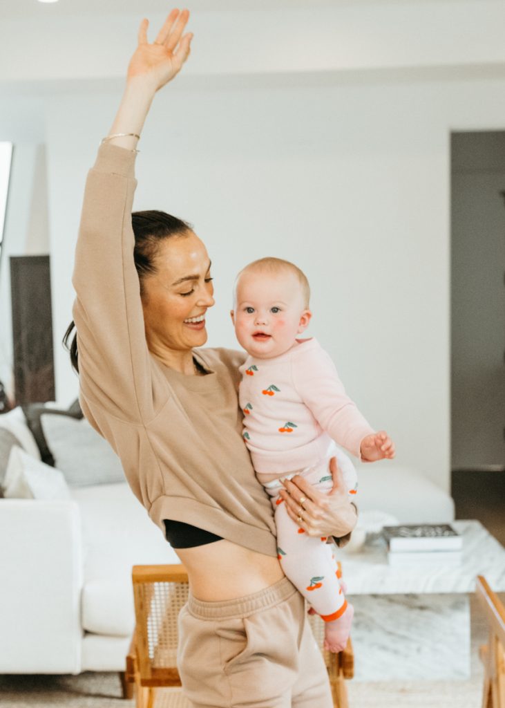 Megan Roup dancing with her baby at home_best nontoxic laundry detergents
