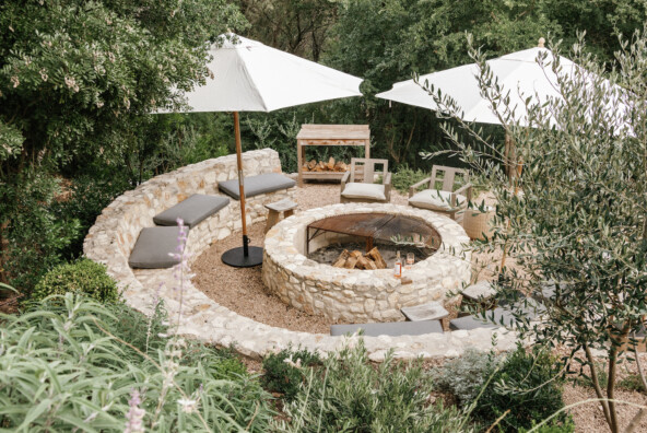 camille styles backyard firepit with umbrellas