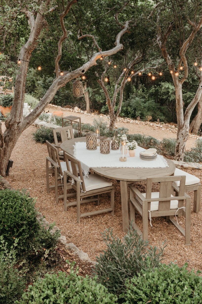 Camille style backyard dining table with string lights