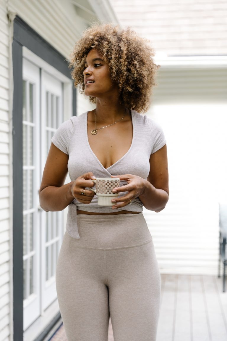 Riley Reed drinking tea outside_internal shower drink