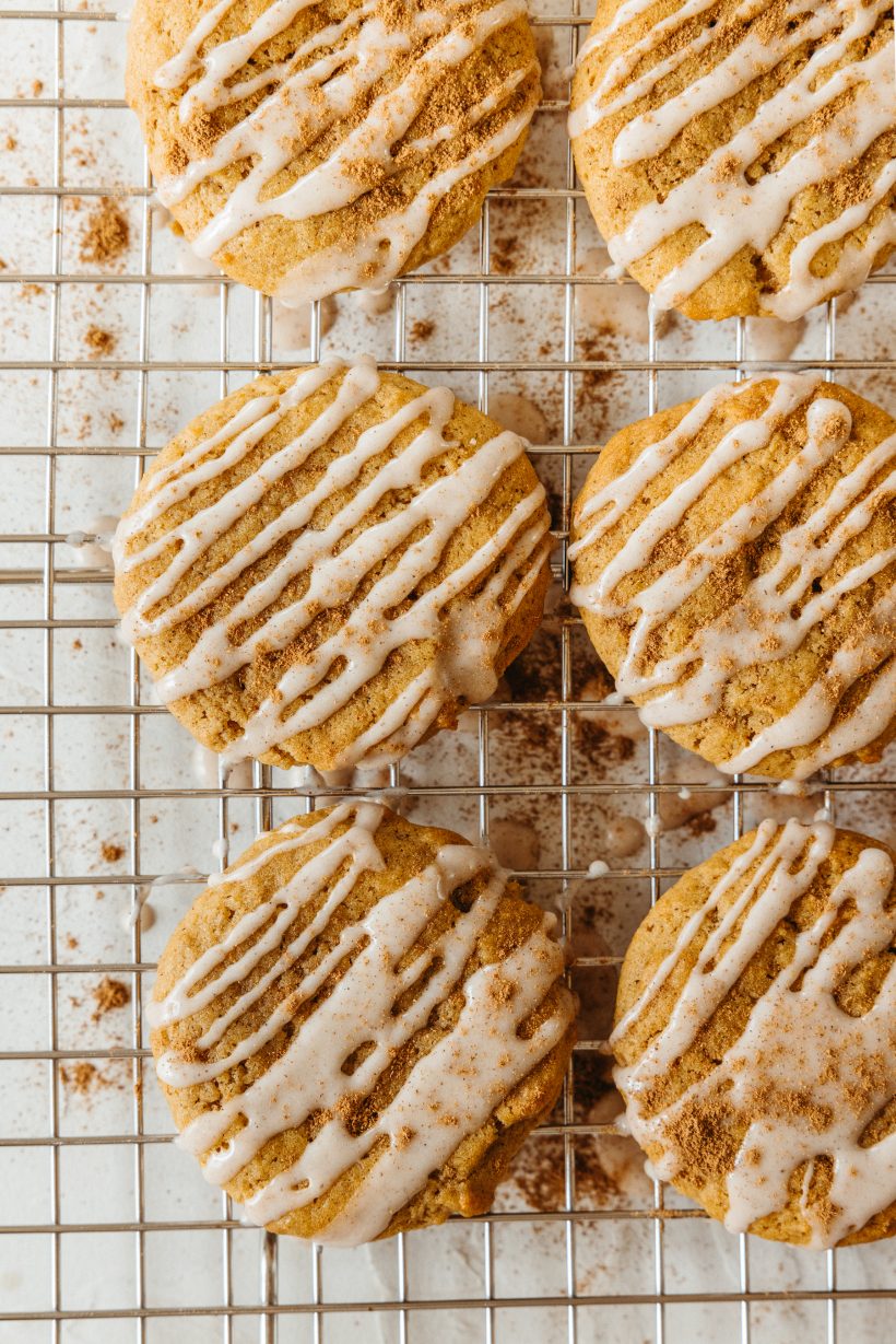 chewy pumpkin spice cookies with cinnamon frosting