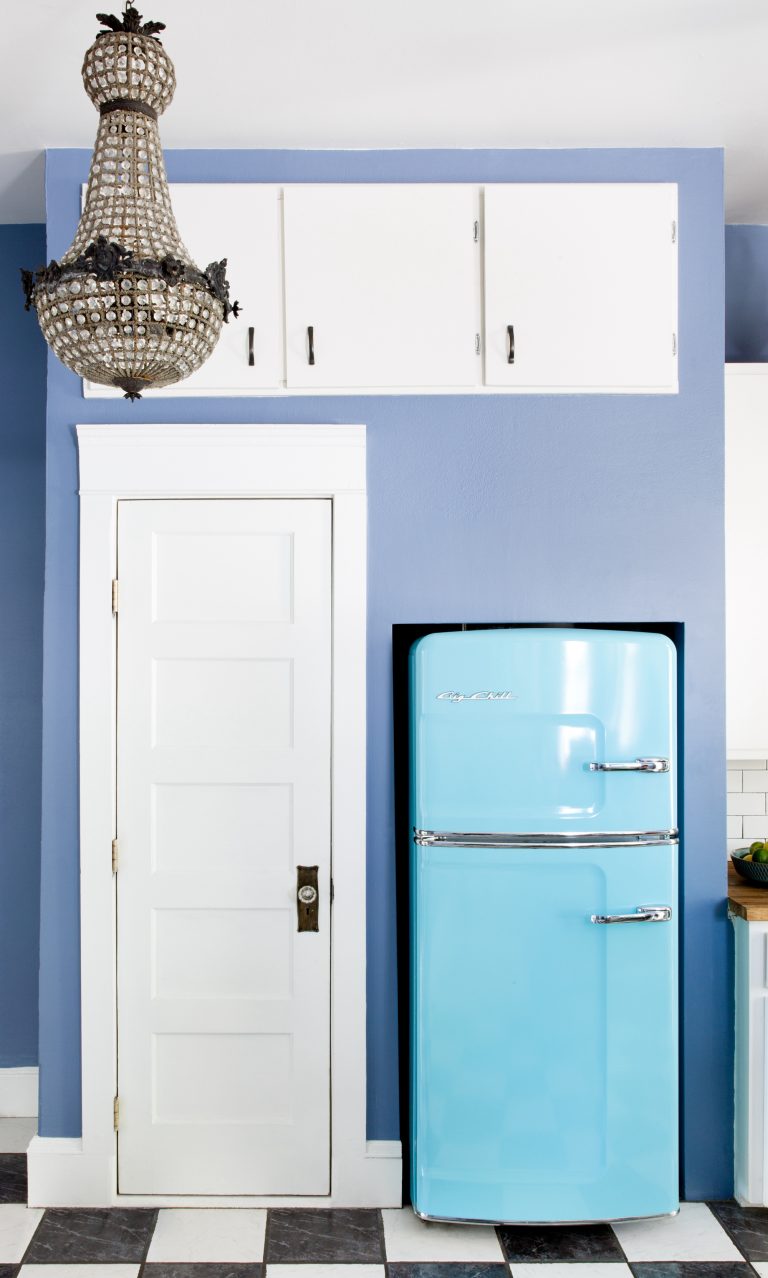 turquoise fridge and blue walls