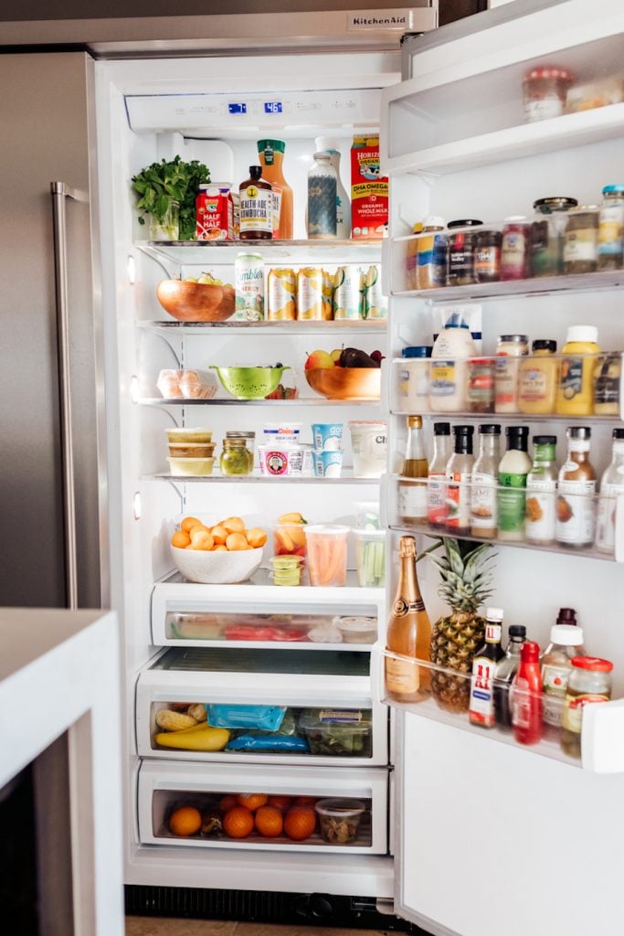 https://camillestyles.com/wp-content/uploads/2022/10/How-to-Stock-Your-Fridge-like-Camille-Styles-683x1024.jpeg