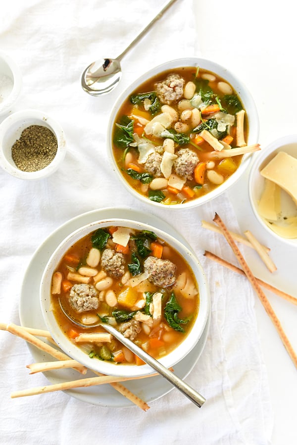 slow Cooker Tuscan White Bean Soup with Sausage from foodieCrush_crockpot meals for a crowd