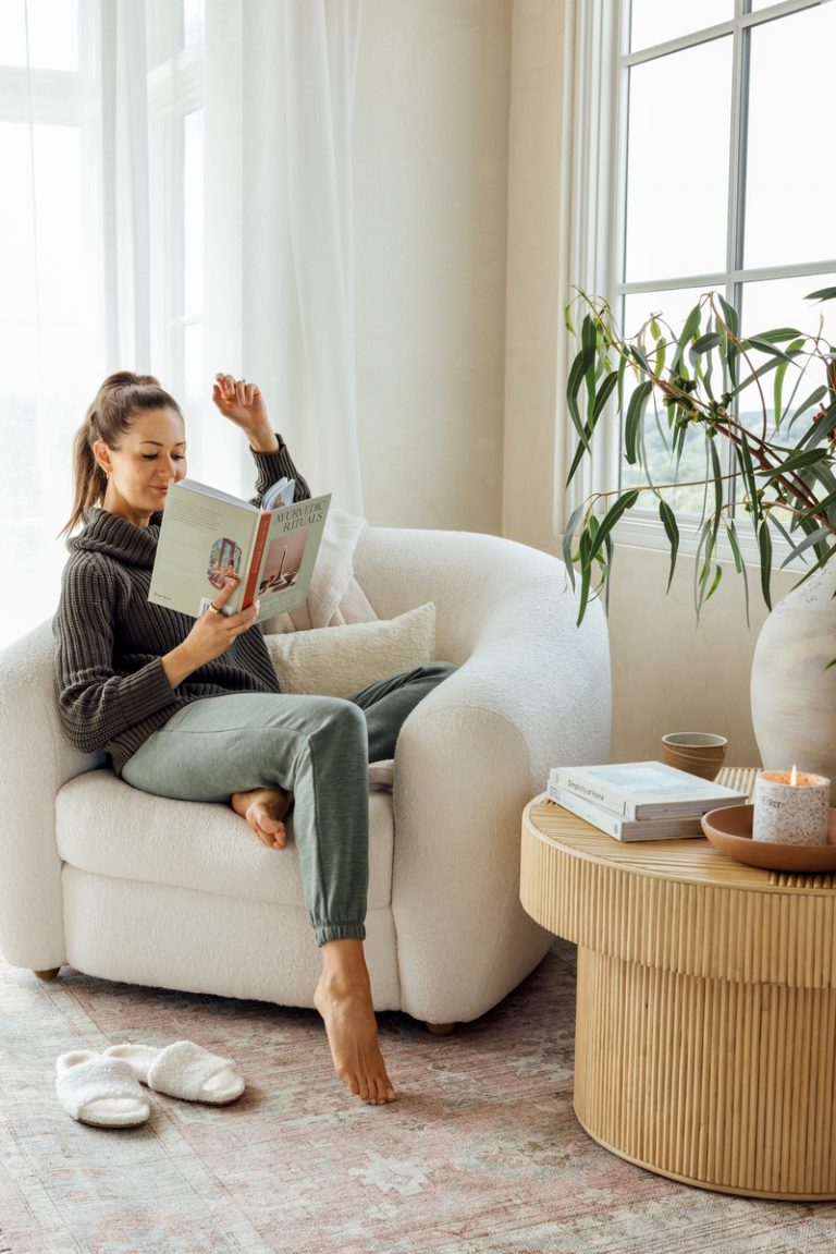 Woman reading the best fall books.