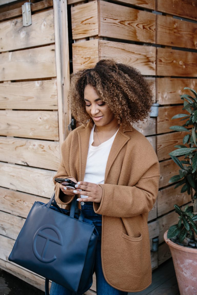 woman looking at phone