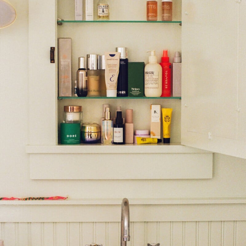 medicine cabinet with skincare products inside