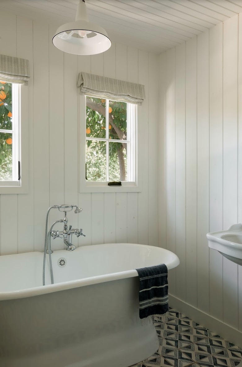 white paneled bath