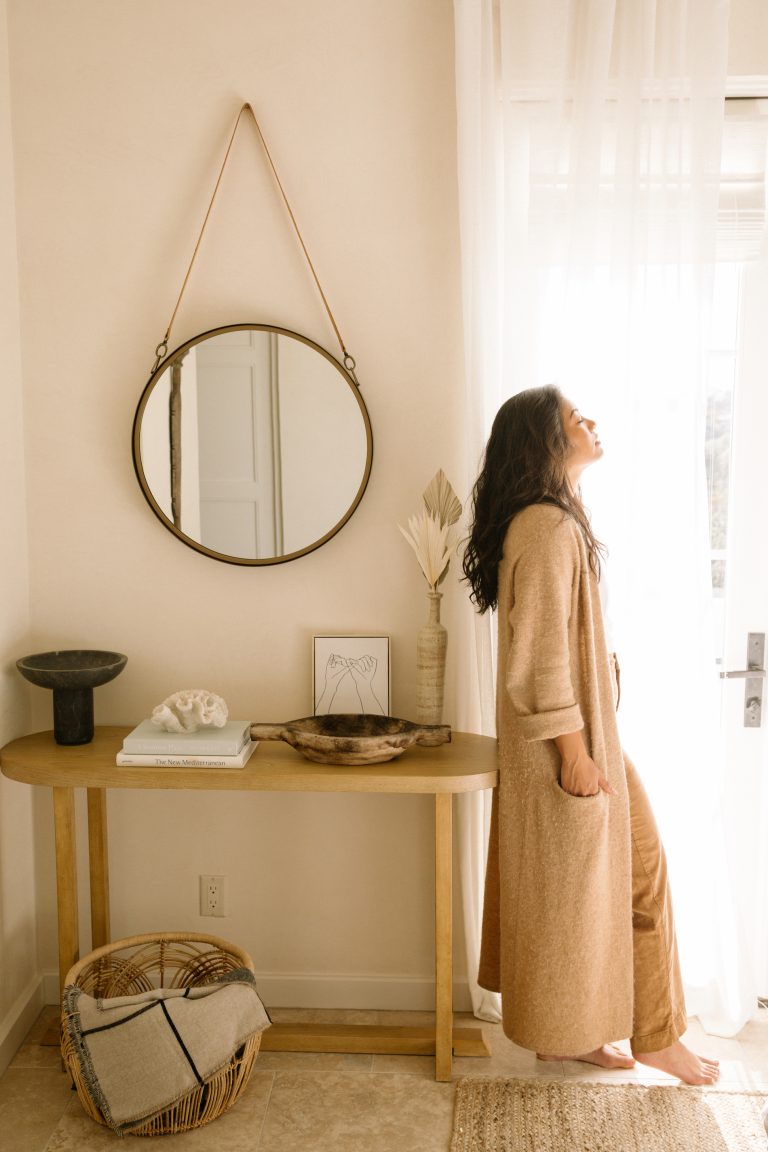 Woman in neutral bedroom_intimacy oils and lubricants