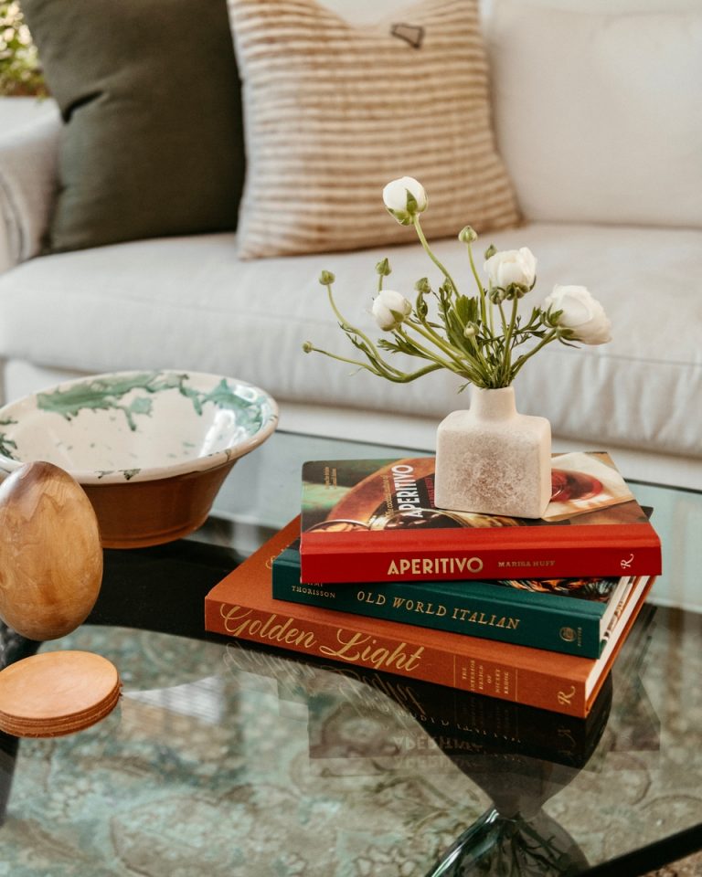 Olivia Muniak coffee table with books and flowers_how to romanticize your life