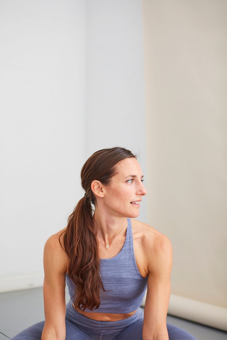 woman with ponytail doing yoga_best hairbrushes