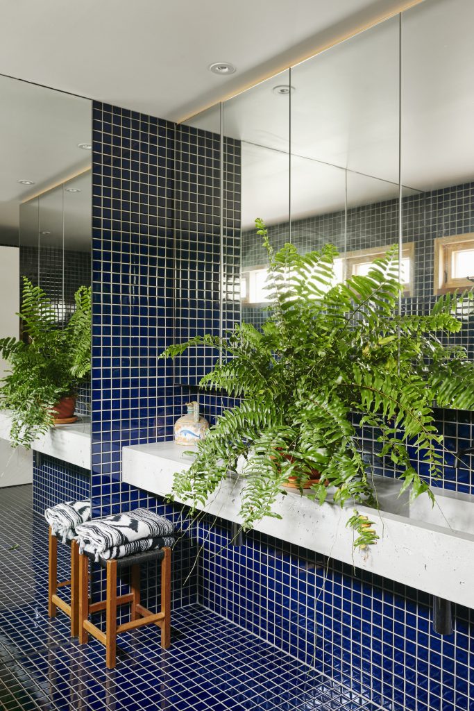 Bright blue tile in bathroom.