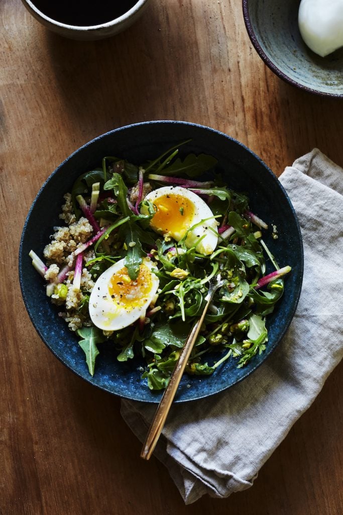 Arugula Breakfast Salad With Toasted Pistachios, Radish, & Soft Eggs new year's day brunch ideas