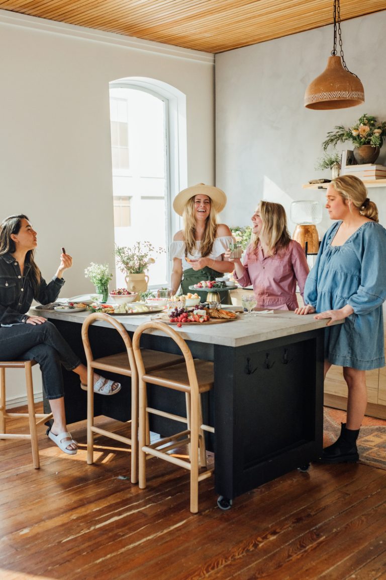 women around a kitchen table_how to boost serotonin naturally