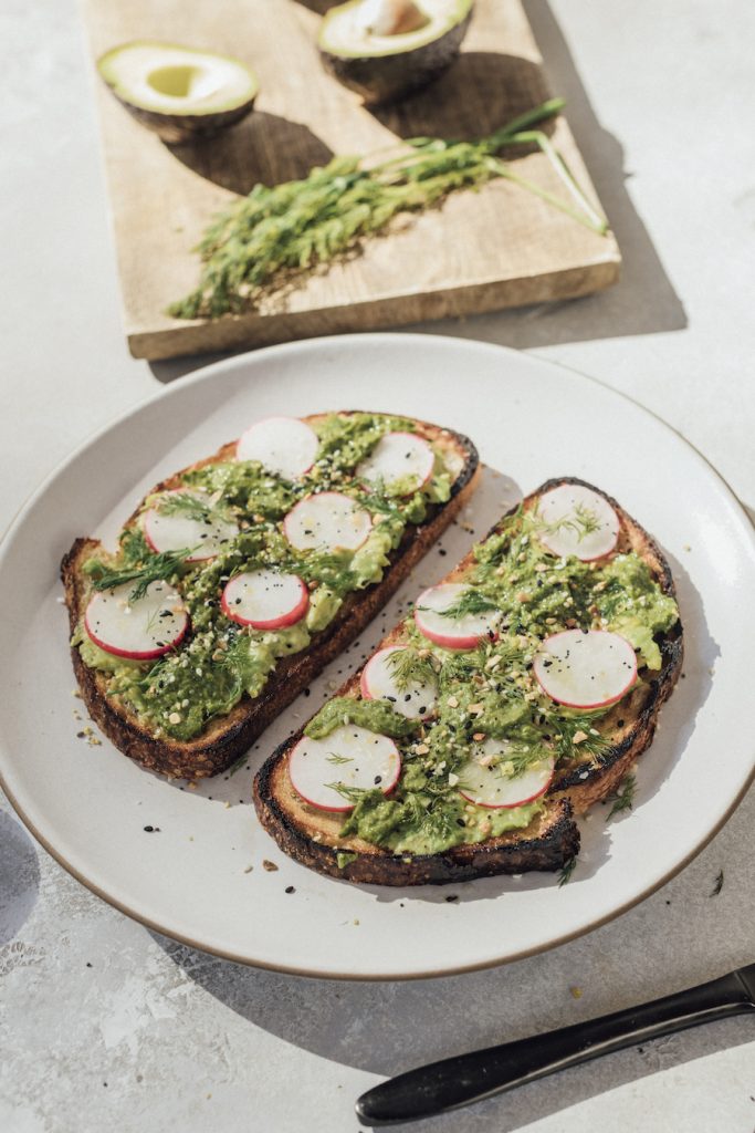 Avocado Toast with Kale Pesto and Crunchy Veggies new year's day brunch ideas
