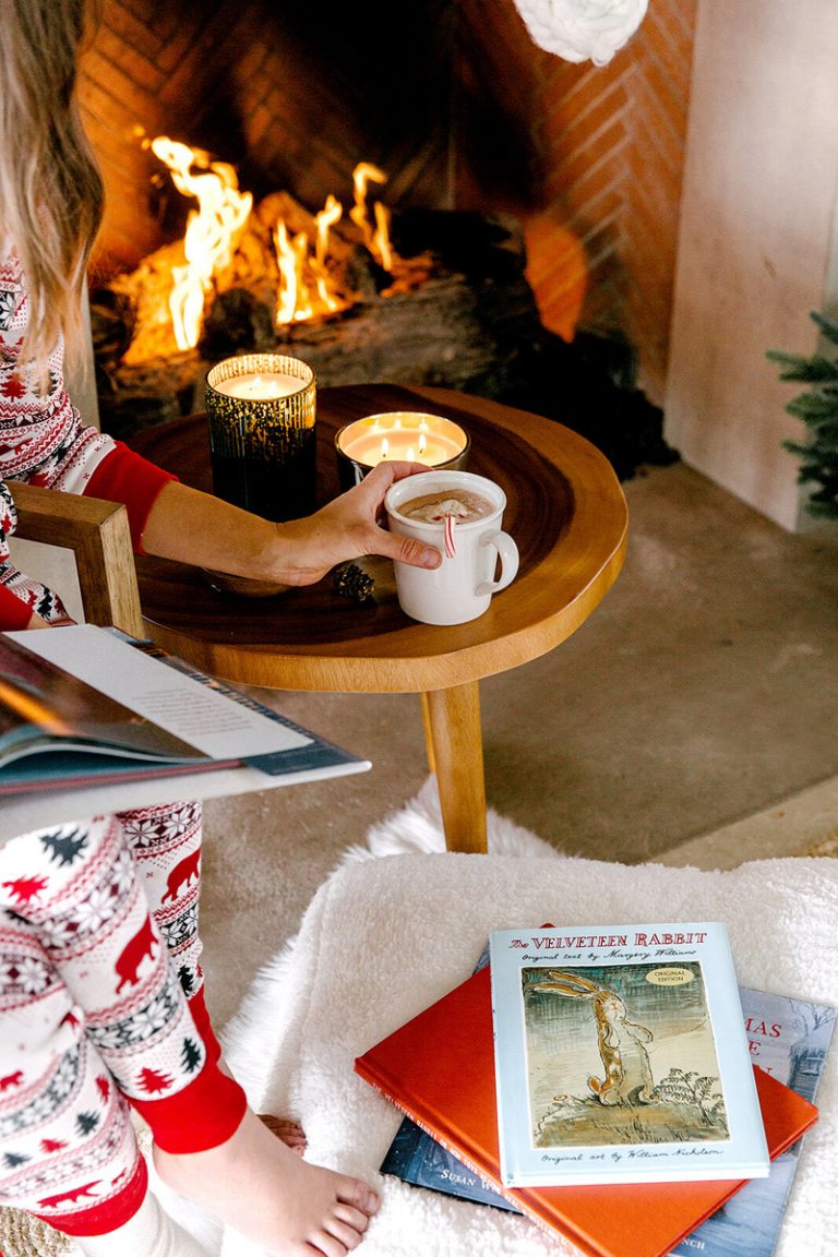 holiday traditions reading by the fireplace