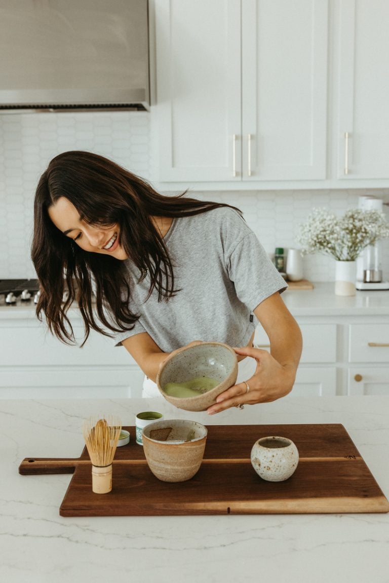 woman making matcha new year intentions