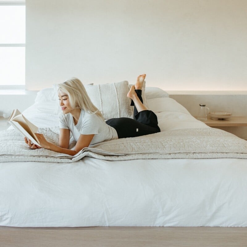 Remi Ishizuka reading in calming bedroom