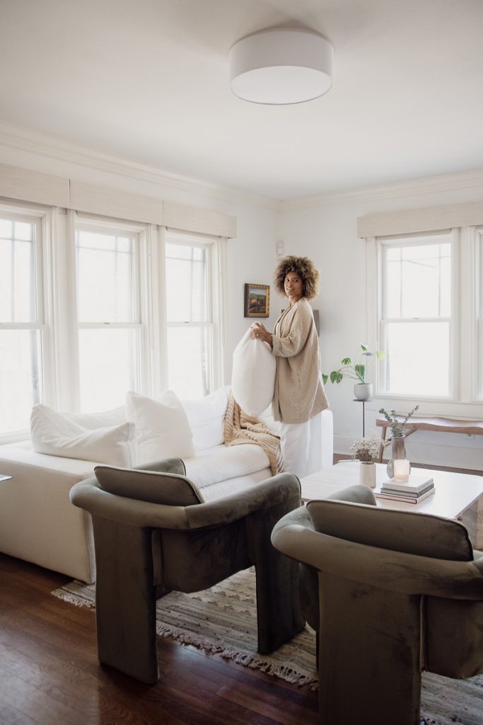 woman cleaning living room gifts for the healthy homebody