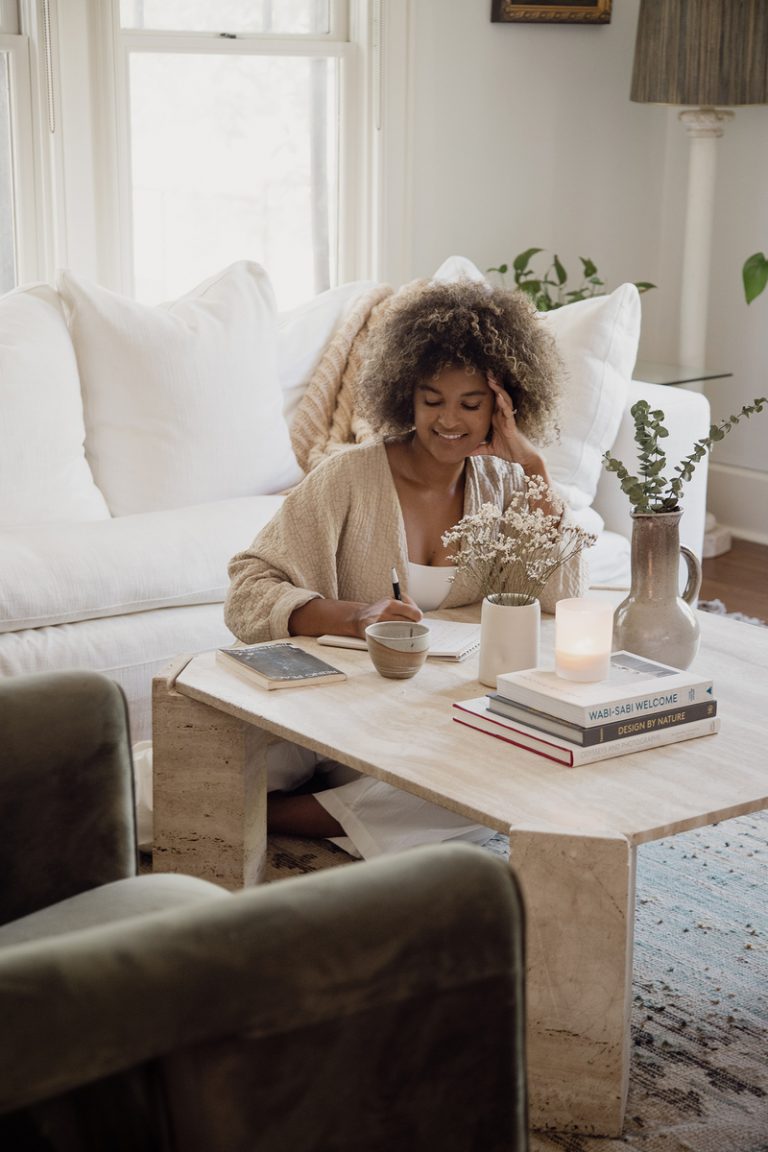 woman journaling in living room best guided journals