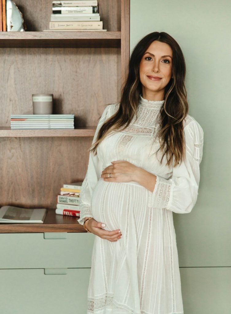 pregnant woman wearing white long dress