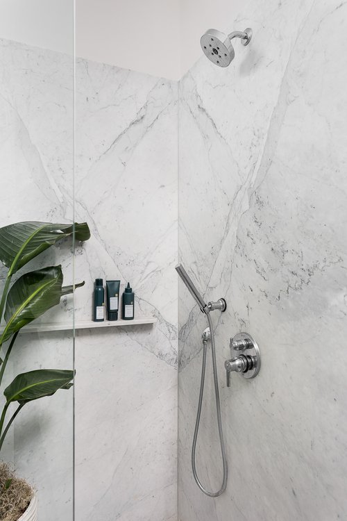 marbled walk-in shower