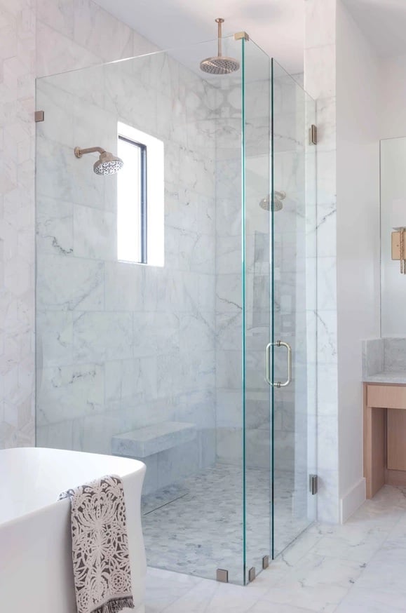 walk-in shower with glass doors