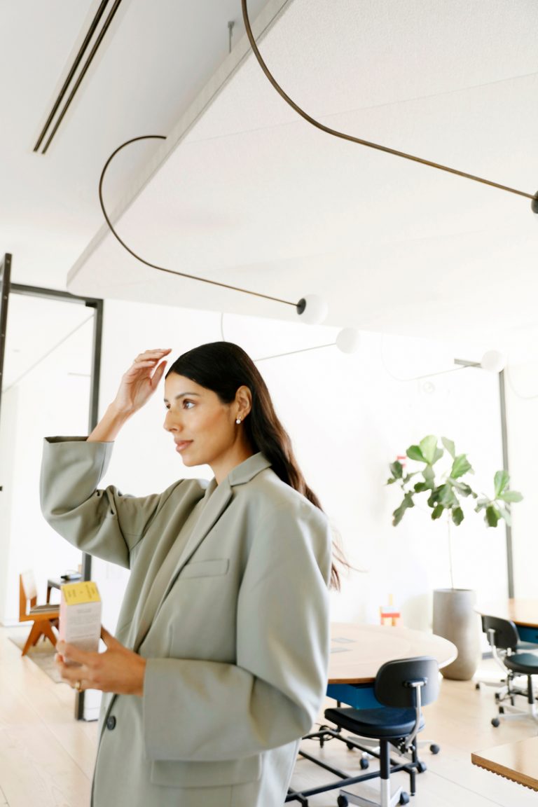 Woman in office with blazer how to be more creative