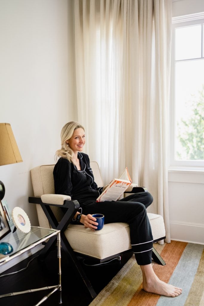 woman reading in pajamas