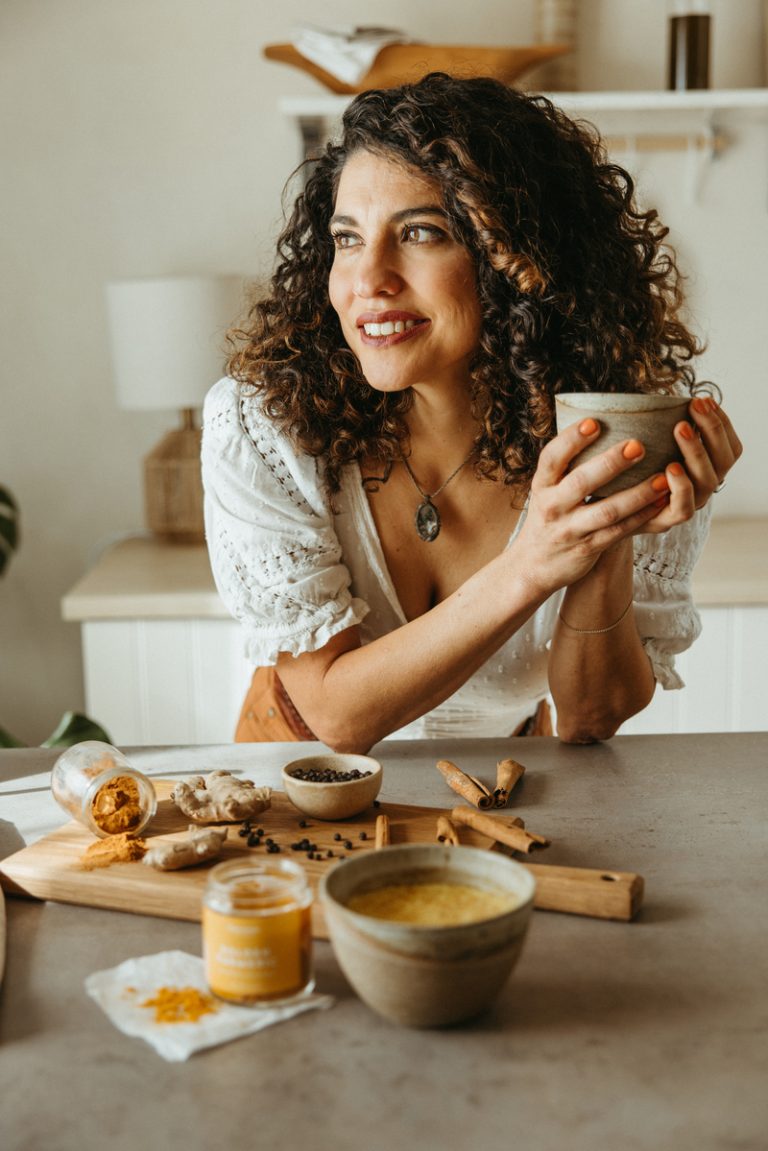 Woman drinking golden milk